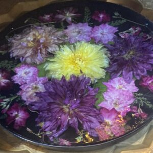 Floral table top only with dried flowers of Dahlias and roses over black background, Can be used as serving tray as well. 20 inch circumference 1nch thickness.