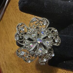 Crystal and silver tone floral ring